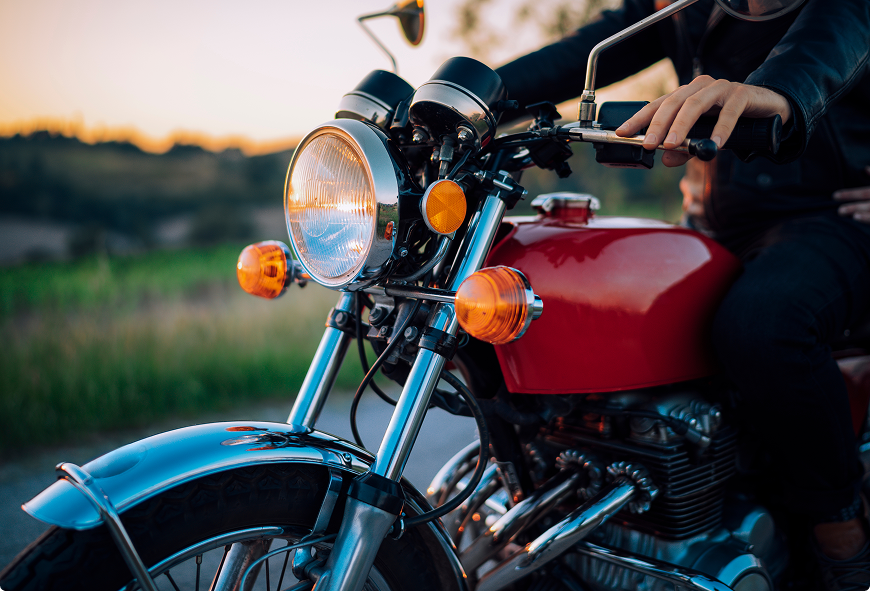 Close up of a red classic motorcycle, representing vintage motorcycle insurance and specialized collector vehicle coverage.